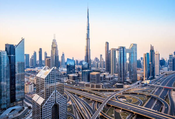 the skyline of dubai during sunrise